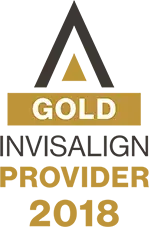 Invisalign Gold Provider 2018 certification badge with triangular logo design