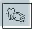Tooth icon with dental tools representing family dental care services